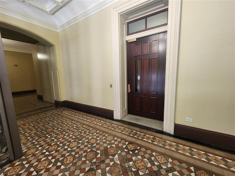 Commercial Style Door – Security door with a narrow 6-inch ballistic window, ideal for schools, offices, and commercial spaces.