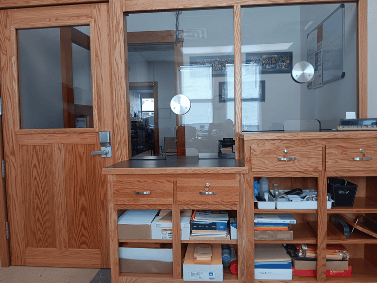 Half Vision Door – Bullet-resistant door with a half-window made of NIJ Level 3A polycarbonate with a transaction window.
