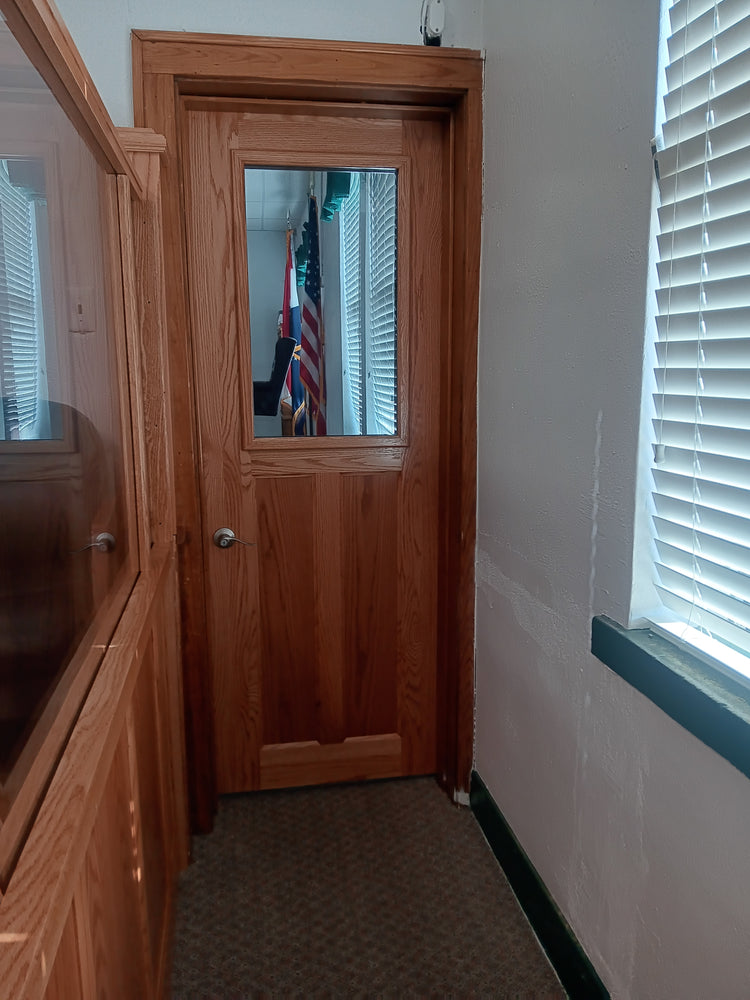 Half Vision Door – Bullet-resistant door with a half-window made of NIJ Level 3A polycarbonate for added visibility and protection.
