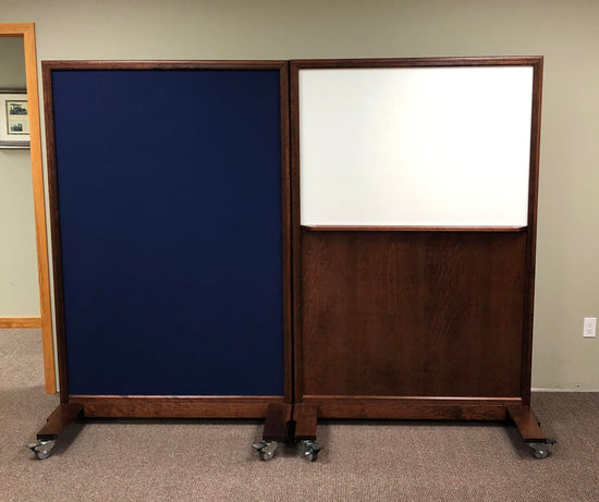 Portable NIJ Level III ballistic panel with a whiteboard, tackable surface, and locking casters for school safety and security.