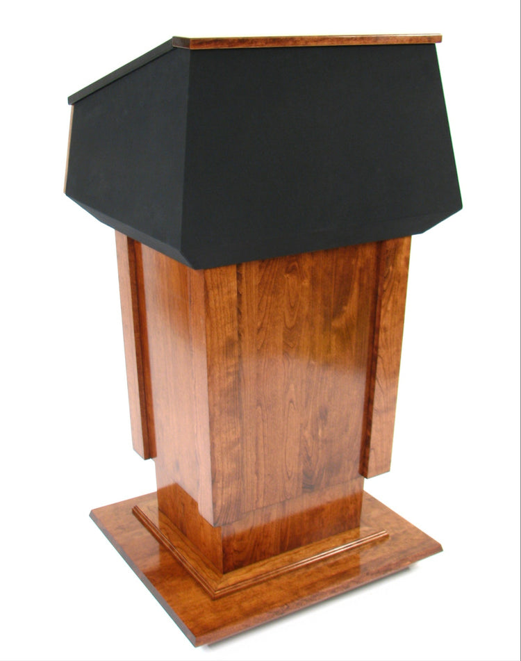 Height-adjustable wooden podium with magnetic front for logos, leather handrails, and a drop-down work surface for presentations.