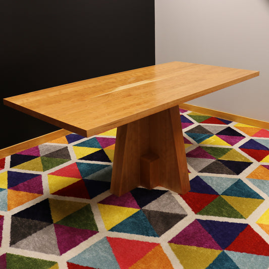 Handcrafted executive office table featuring a luxurious solid cherry wood top. The table showcases a smooth, rich cherry finish with intricate wood grain details, perfect for adding a timeless and professional touch to any office space. american made durable steady