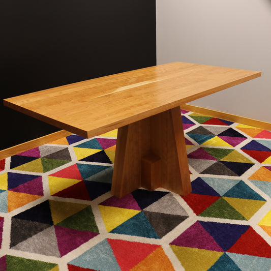 Handcrafted executive office table featuring a luxurious solid cherry wood top. The table showcases a smooth, rich cherry finish with intricate wood grain details, perfect for adding a timeless and professional touch to any office space. american made durable steady