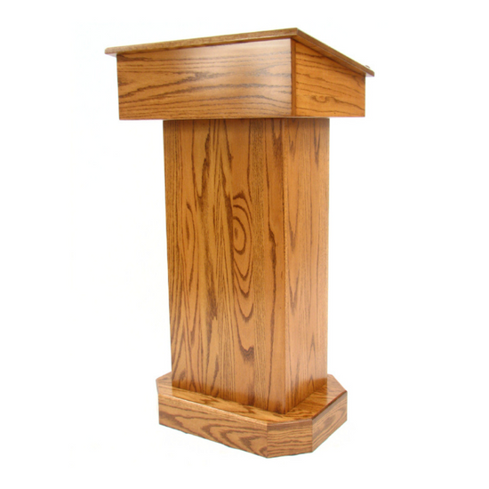 "Senator™ Solid Hardwood Podium, featuring a sleek design made from durable solid wood. It includes a spacious work surface, hidden rear casters for easy mobility, and ample storage space for supplies. Perfect for schools, churches, and event venues." American made craftsmanship Lectern