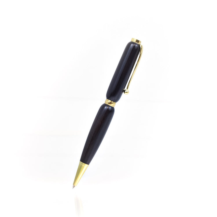 Handcrafted African Blackwood pen with glossy finish and refillable black ballpoint ink insert, made in Missouri