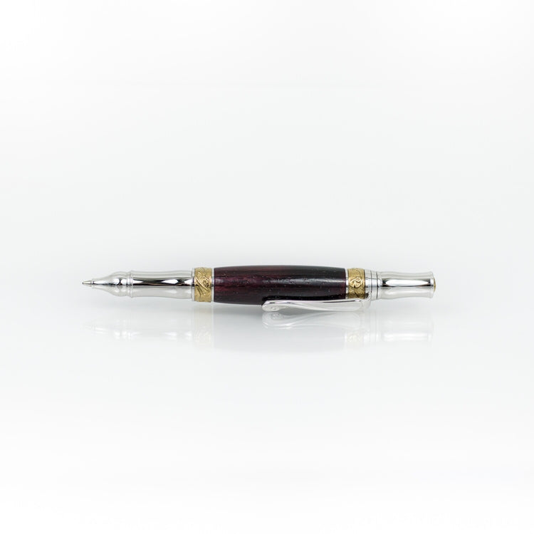 Handcrafted African Blackwood rollerball pen with 24K gold accents