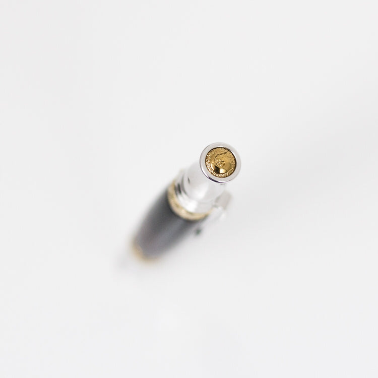 Handcrafted African Blackwood rollerball pen with 24K gold accents