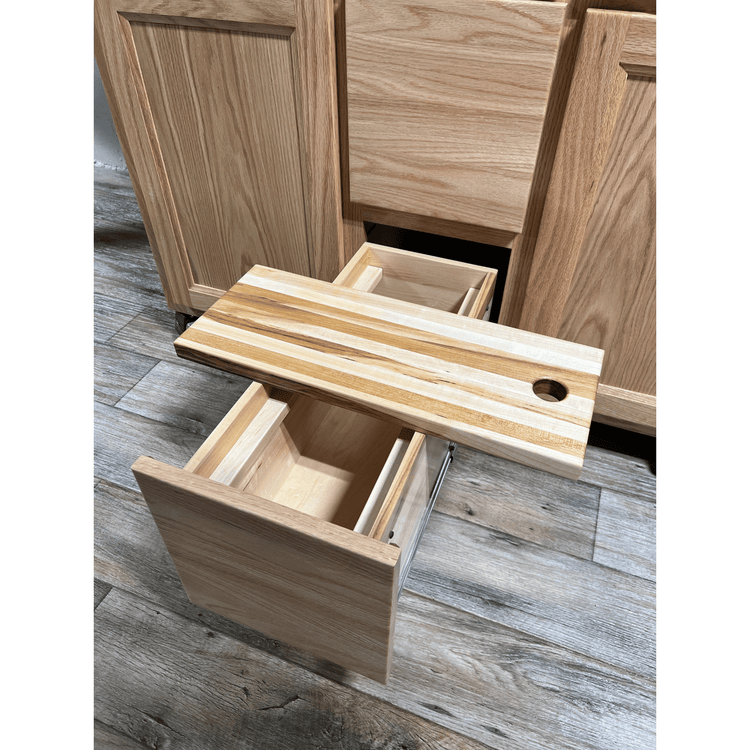 Rolling butcher block island with storage, soft-close drawers, knife holder, and locking wheels for kitchen or outdoor use.