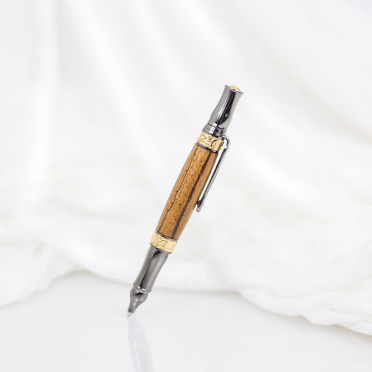 Handcrafted Marblewood rollerball pen with 24K gold accents