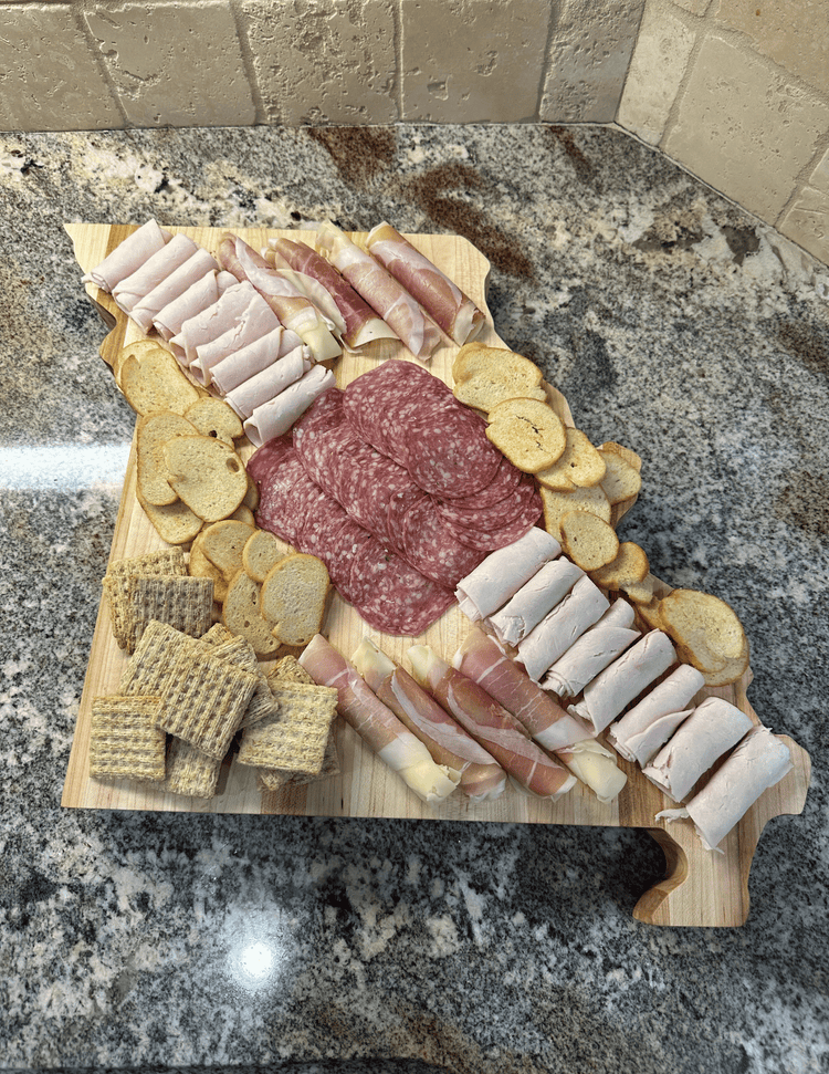 Missouri Handcrafted state-shaped charcuterie board made from solid American hard maple, featuring engraved details and a food-safe finish.