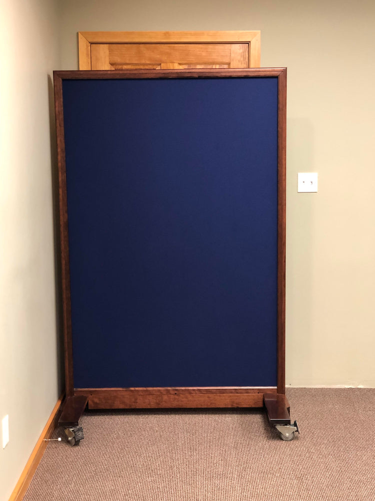 Portable NIJ Level III ballistic panel with a whiteboard, tackable surface, and locking casters for school safety and security.