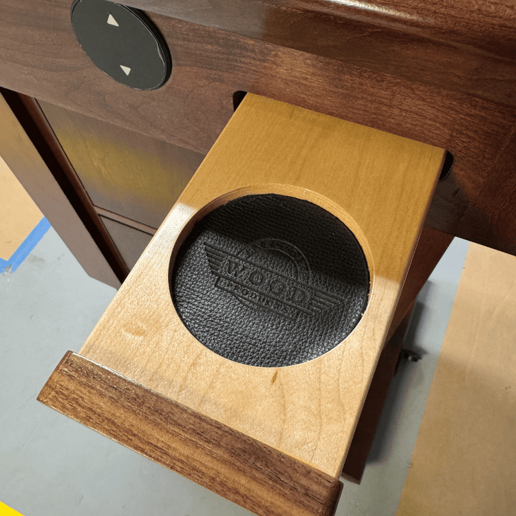 Leather lined Pop-out cup holder for a presidential podium.