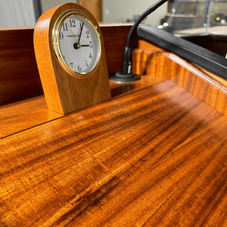 Premium solid wood sound podium with built-in speakers, gooseneck microphone, LED light, magnetic logo system, and pop-out beverage holder.