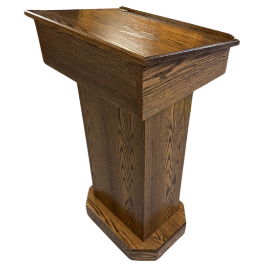 Senator Lectern – Solid red oak podium with storage, hidden casters, and a removable shelf. Handcrafted in the USA.