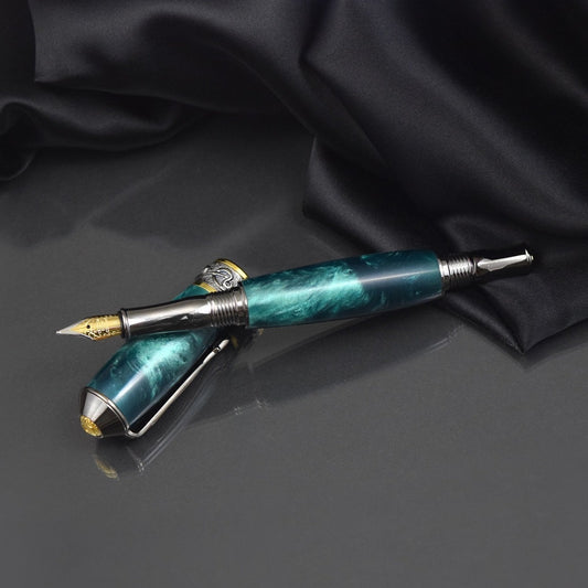 Handcrafted teal acrylic fountain pen with precious metal body