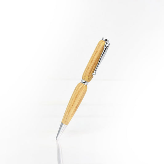 Handcrafted Missouri Ash wood pen with high-gloss finish and refillable black ballpoint ink insert