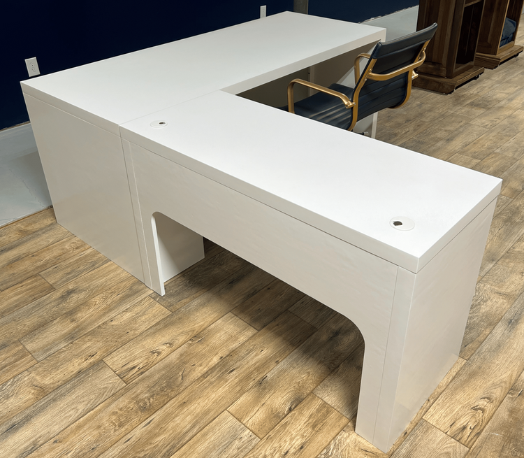 Modern white L-shaped desk of durable maple, with spacious surface, cable grommets, easy assembly for home or office use