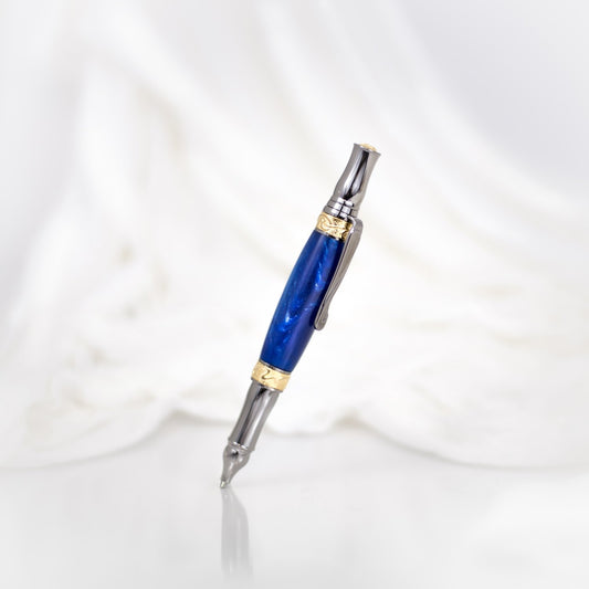 Handcrafted sapphire acrylic rollerball pen with precious metal body