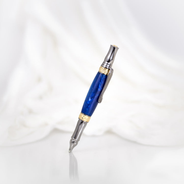 Handcrafted sapphire acrylic rollerball pen with precious metal body