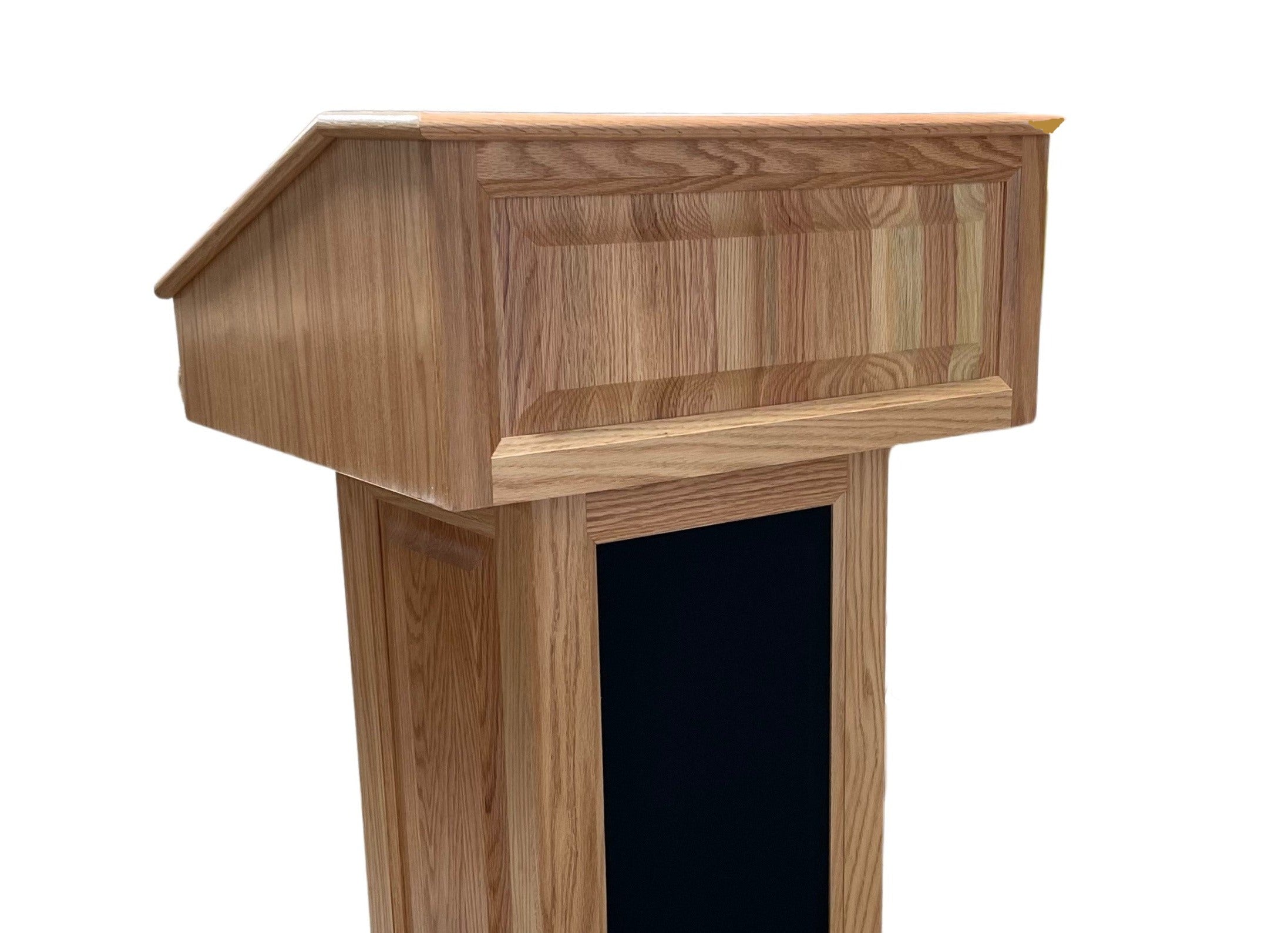 The Counselor Evolution Lift™ lectern, handcrafted from oak wood, features adjustable height, built-in sound system, and mobility casters.