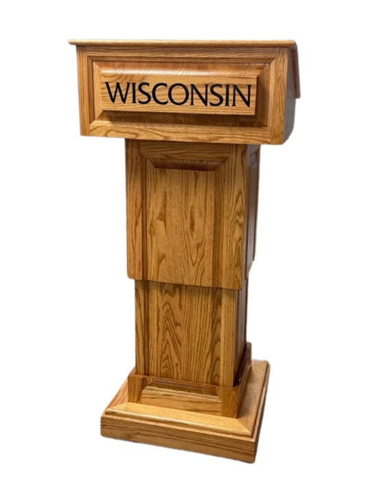 Counselor Lift™ Podium with electric height adjustment, premium hardwood, and mobility casters, ideal for professional settings.