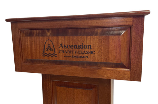 Counselor Swivel™ Podium with 45-degree swivel mechanism, adjustable work surface, and engraved top.