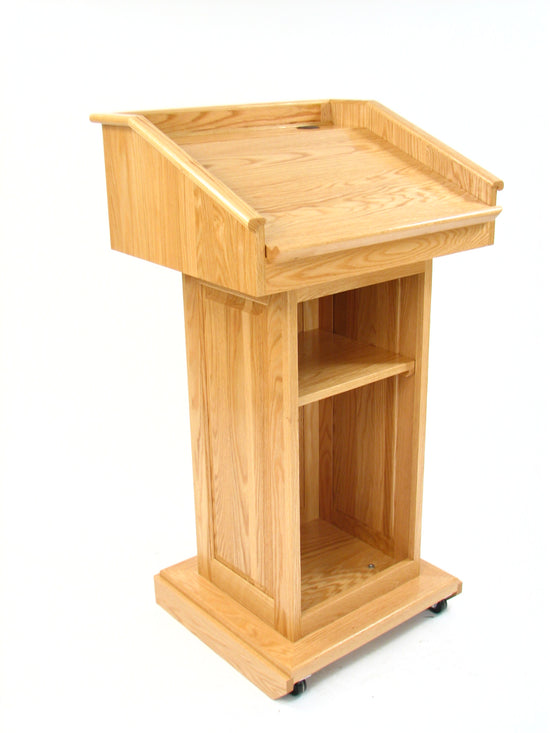 Counselor Swivel™ Podium with 45-degree swivel mechanism, adjustable work surface, and premium hardwood construction.