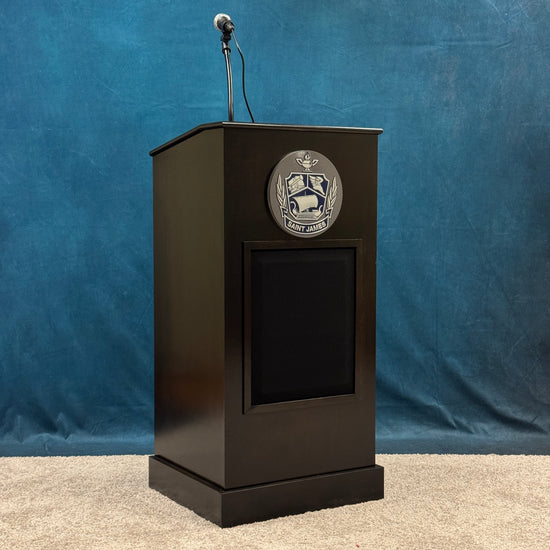 Black podium with a logo on a blue background