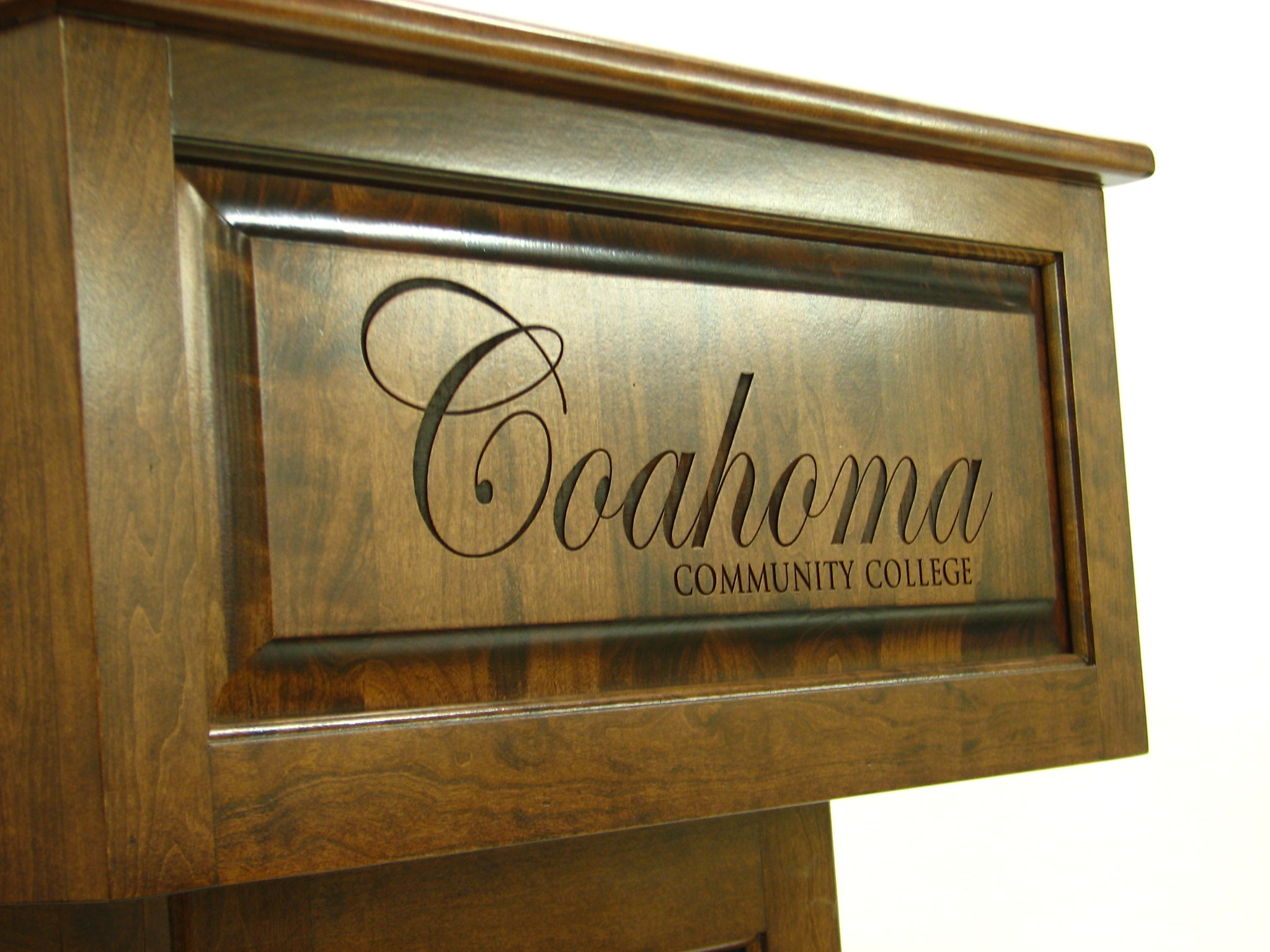 Precision laser-engraved magnetic plaque or direct engraving on lectern, up to 12 inches.