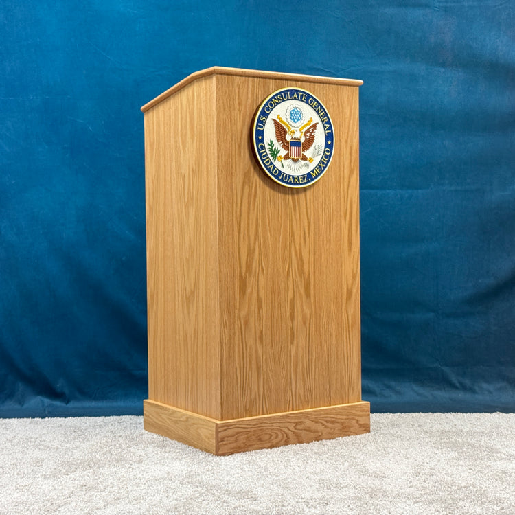 Wooden oak podium with a seal on a blue background