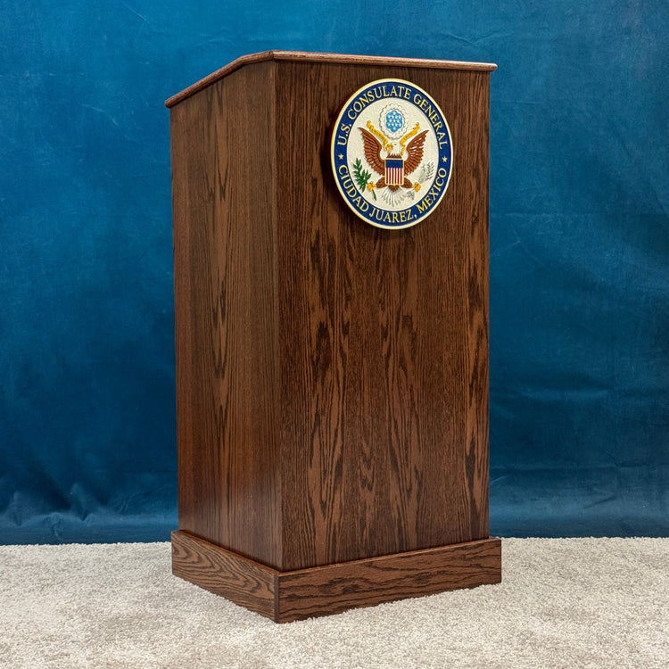 Wooden podium with a seal on a blue background