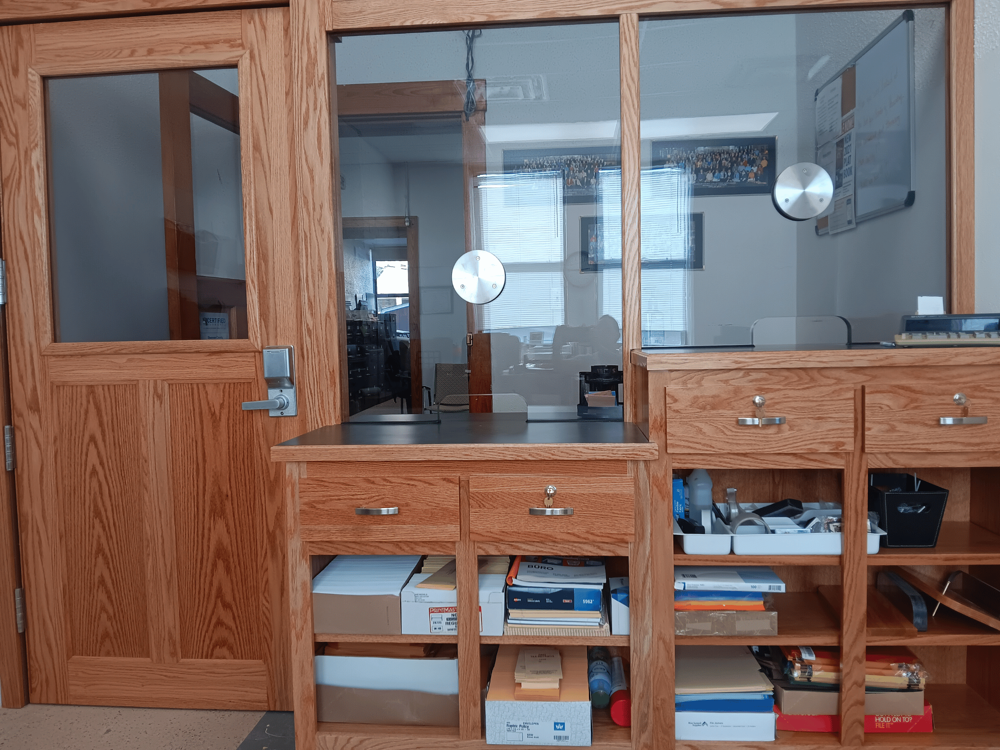 Half Vision Door – Bullet-resistant door with a half-window made of NIJ Level 3A polycarbonate with a transaction window.