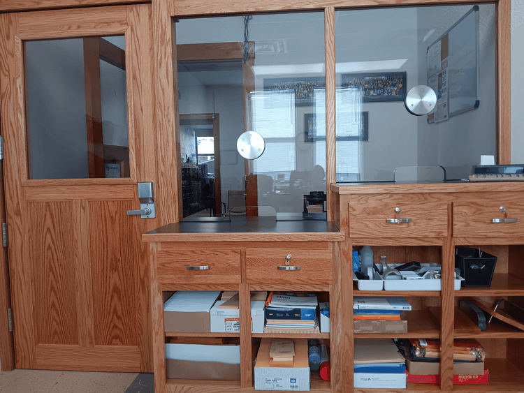 Half Vision Door – Bullet-resistant door with a half-window made of NIJ Level 3A polycarbonate with a transaction window.