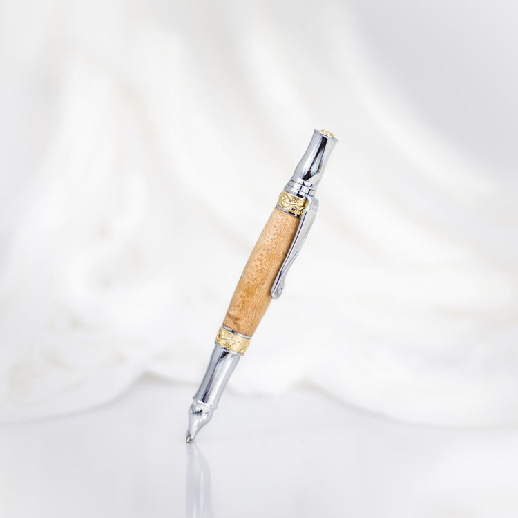 Handcrafted Sycamore wood rollerball pen with precious metal body