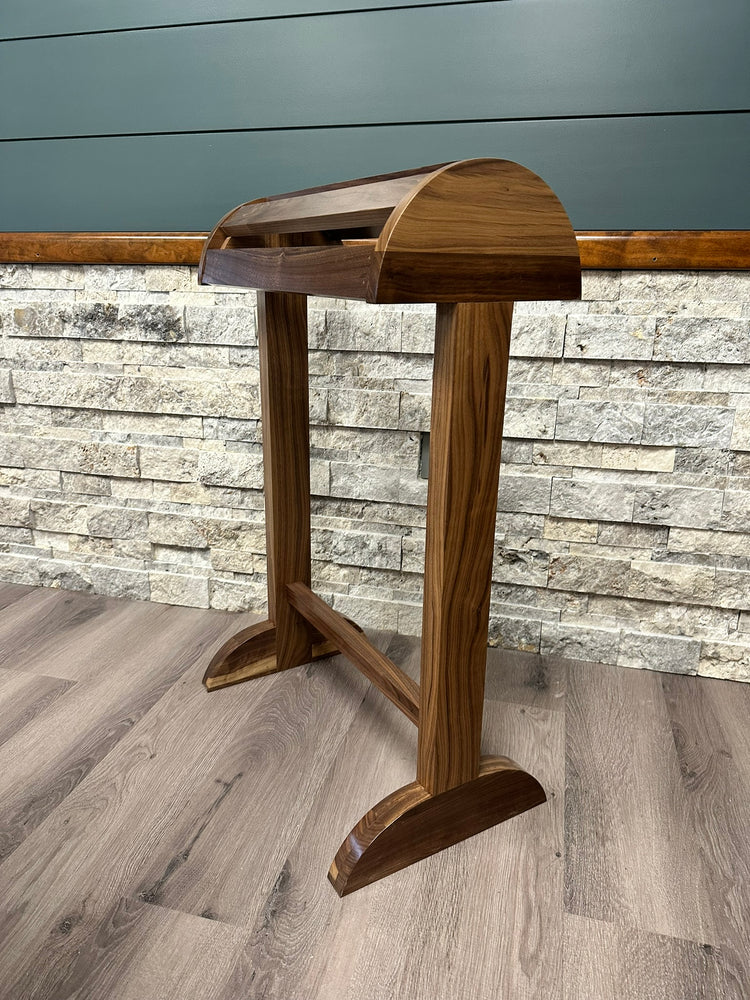 Solid wood saddle stand with a smooth finish, designed for stable and secure saddle storage. The stand features a sturdy base and simple, rustic design, perfect for any equestrian space. Handcrafted for durability and style. American made handcrafted