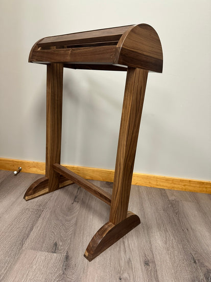 Solid wood saddle stand with a smooth finish, designed for stable and secure saddle storage. The stand features a sturdy base and simple, rustic design, perfect for any equestrian space. Handcrafted for durability and style. American made handcrafted