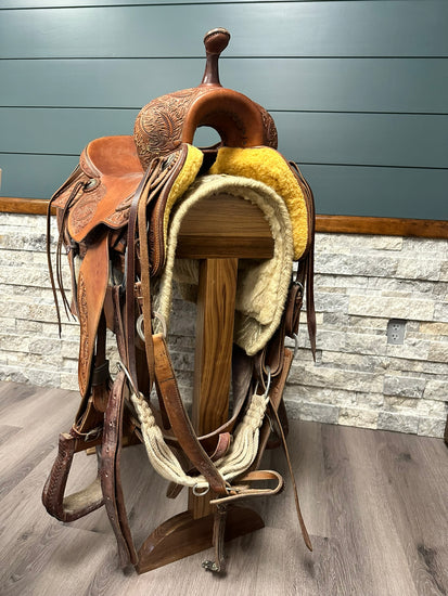 Solid wood saddle stand with a smooth finish, designed for stable and secure saddle storage. The stand features a sturdy base and simple, rustic design, perfect for any equestrian space. Handcrafted for durability and style. American made handcrafted