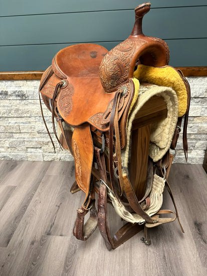 Solid wood saddle stand with a smooth finish, designed for stable and secure saddle storage. The stand features a sturdy base and simple, rustic design, perfect for any equestrian space. Handcrafted for durability and style. American made handcrafted