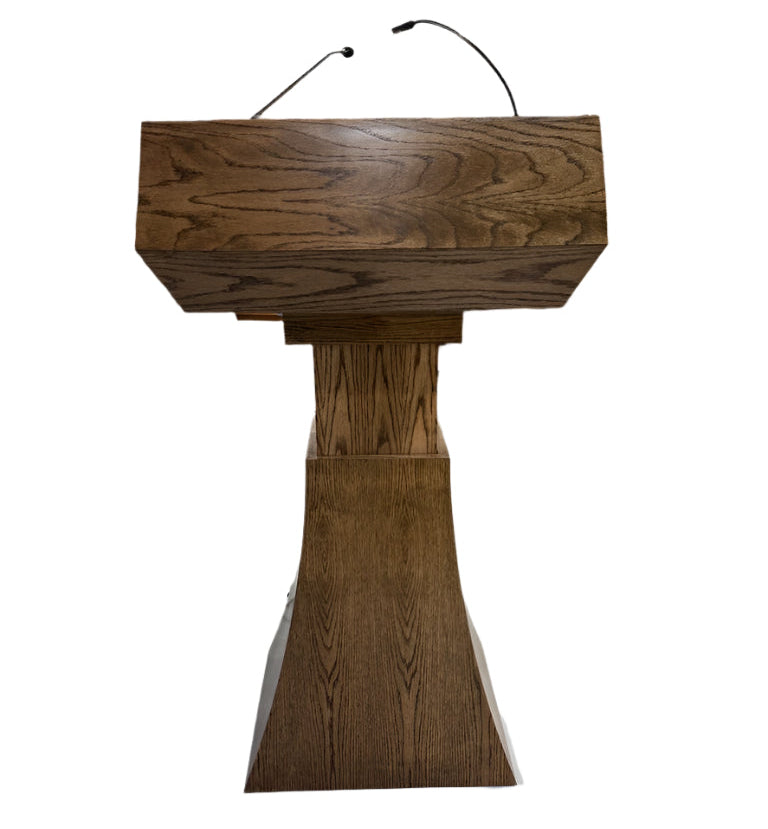 "StatesMan AutoGlide™ Height Adjustable Lift Podium, featuring a smooth, modern design with a sleek lift mechanism, allowing easy adjustment for different speaker heights and creating a versatile and professional presentation space. American made craftsmanship
