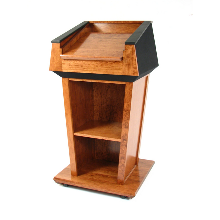 "Presidential™ Solid Hardwood Podium featuring a sleek, classic design with rich wood finish. The podium is crafted from solid hardwood, providing a sturdy and elegant stand for presentations, speeches, and lectures. Ideal for professional settings like conferences, universities, and executive meetings. TEXTILE FABRIC COVERING TOP SEAMLESS AMERICAN MADE HANDCRAFTED LECTERN MOBILE