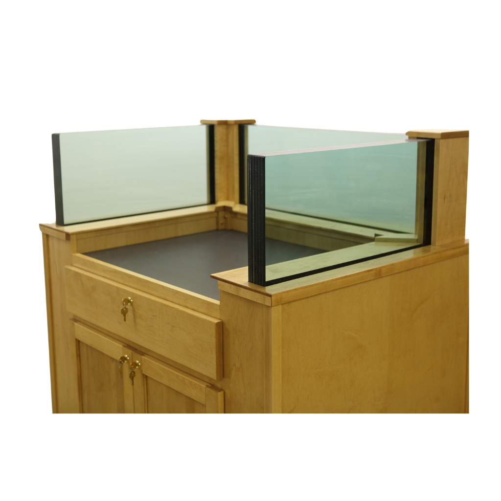 "Protector™ NIJ3 Bullet Resistant Mobile Workstation with a sturdy, sleek design. The workstation features a robust, armored body for enhanced security, mobility with hidden wheels, and ample workspace for efficient and safe operation in high-risk environments."