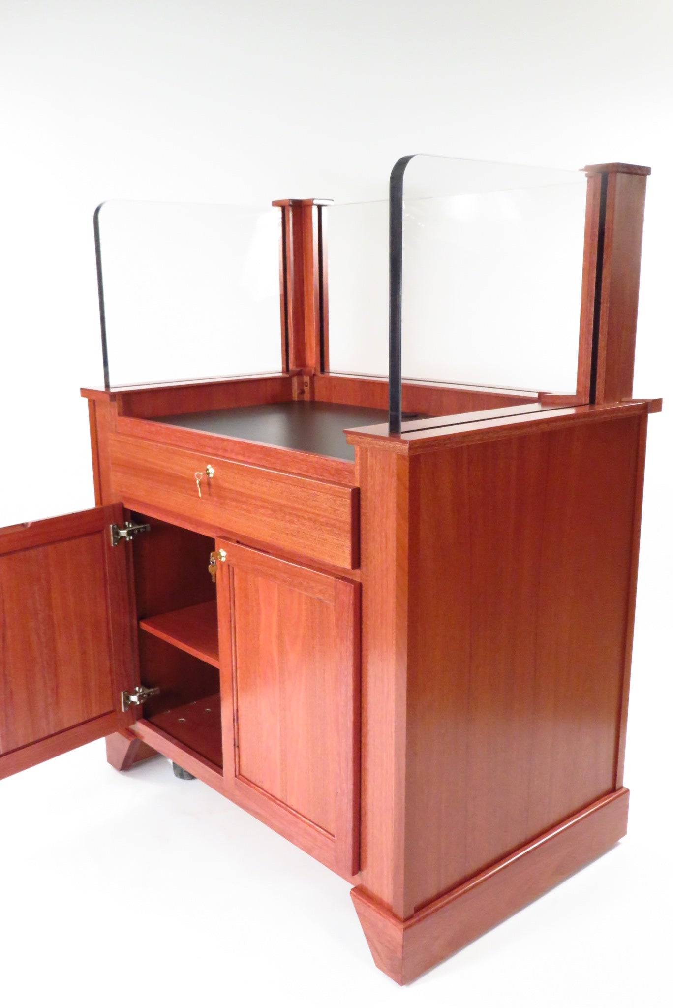 "Protector™ NIJ3 Bullet Resistant Mobile Workstation with a sturdy, sleek design. The workstation features a robust, armored body for enhanced security, mobility with hidden wheels, and ample workspace for efficient and safe operation in high-risk environments."