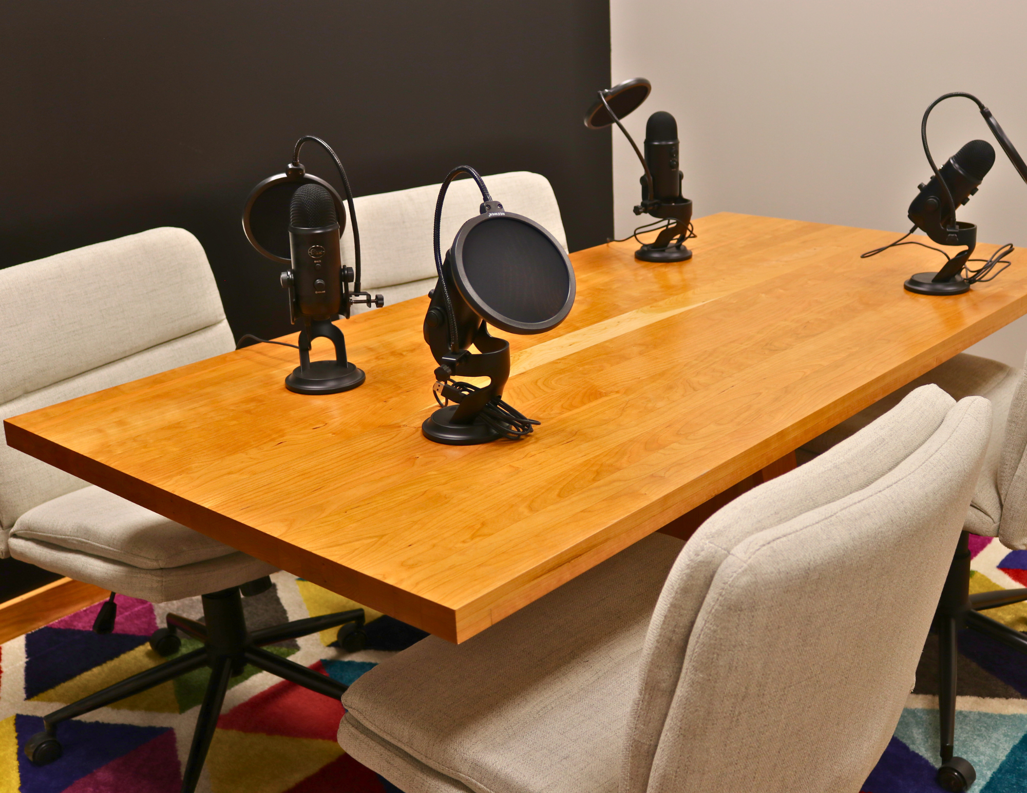 Handcrafted executive office table featuring a luxurious solid cherry wood top. The table showcases a smooth, rich cherry finish with intricate wood grain details, perfect for adding a timeless and professional touch to any office space. american made durable steady