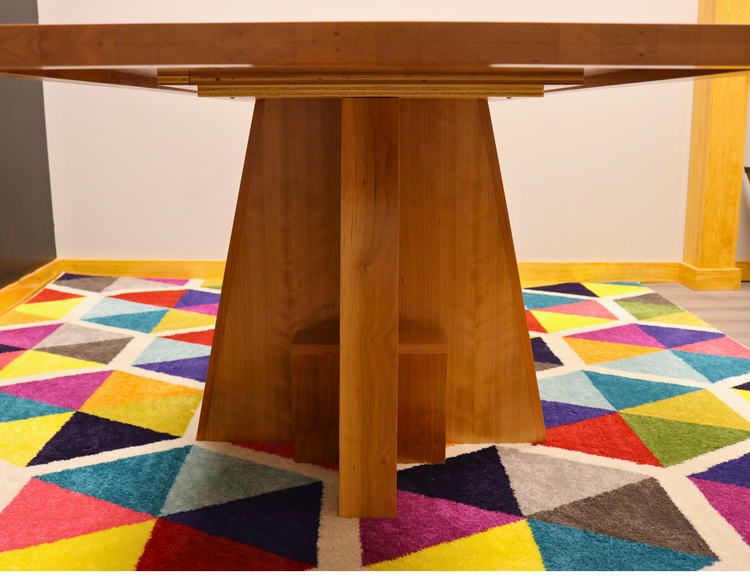 Handcrafted executive office table featuring a luxurious solid cherry wood top. The table showcases a smooth, rich cherry finish with intricate wood grain details, perfect for adding a timeless and professional touch to any office space. american made durable steady