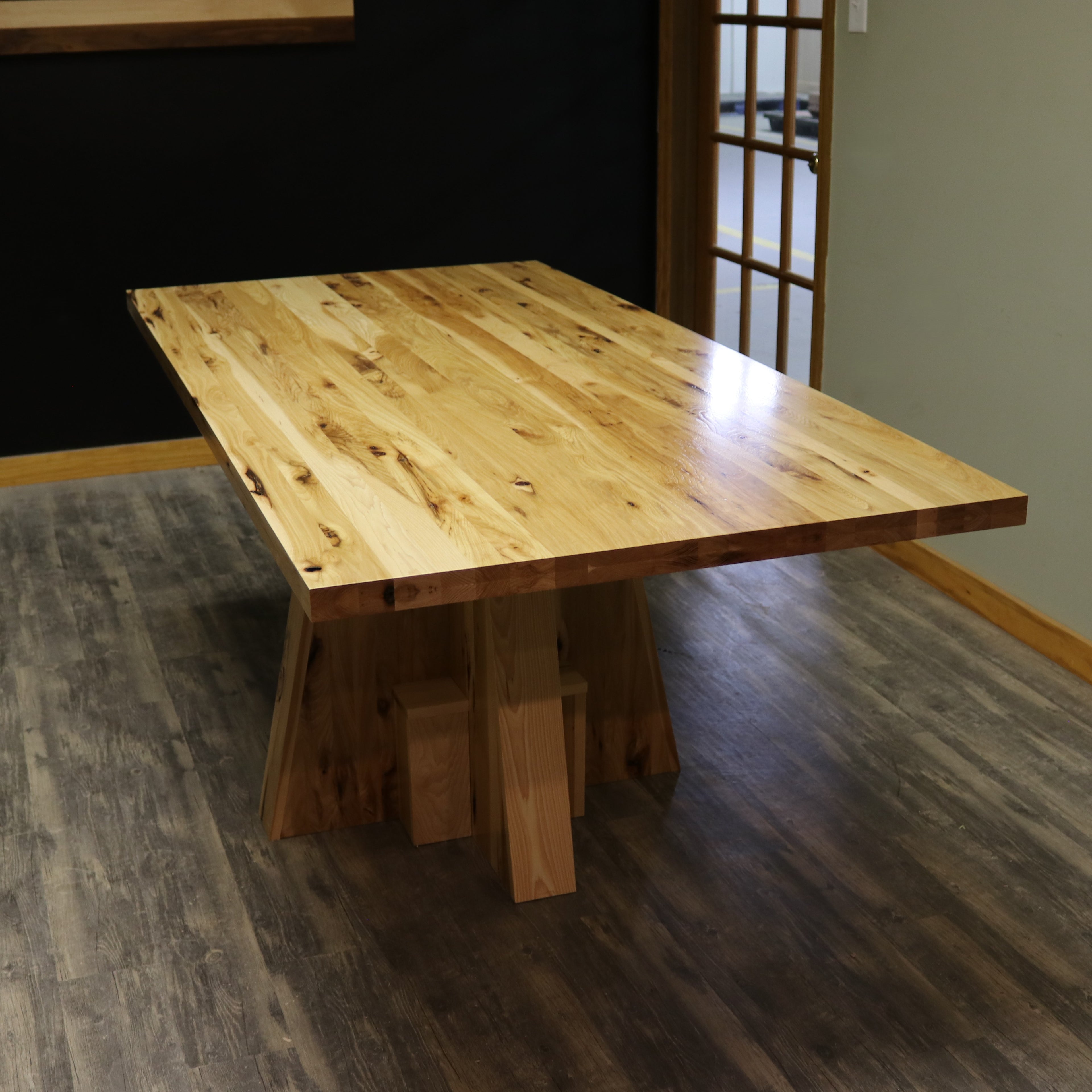 Handcrafted executive office table with a luxurious solid rustic hickory wood top. The table features a rich, natural finish with unique wood grain patterns, adding a touch of sophistication and durability to any office space. American made durable 