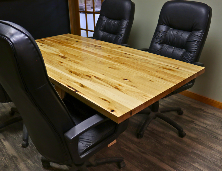 Handcrafted executive office table with a luxurious solid rustic hickory wood top. The table features a rich, natural finish with unique wood grain patterns, adding a touch of sophistication and durability to any office space. American made durable 
