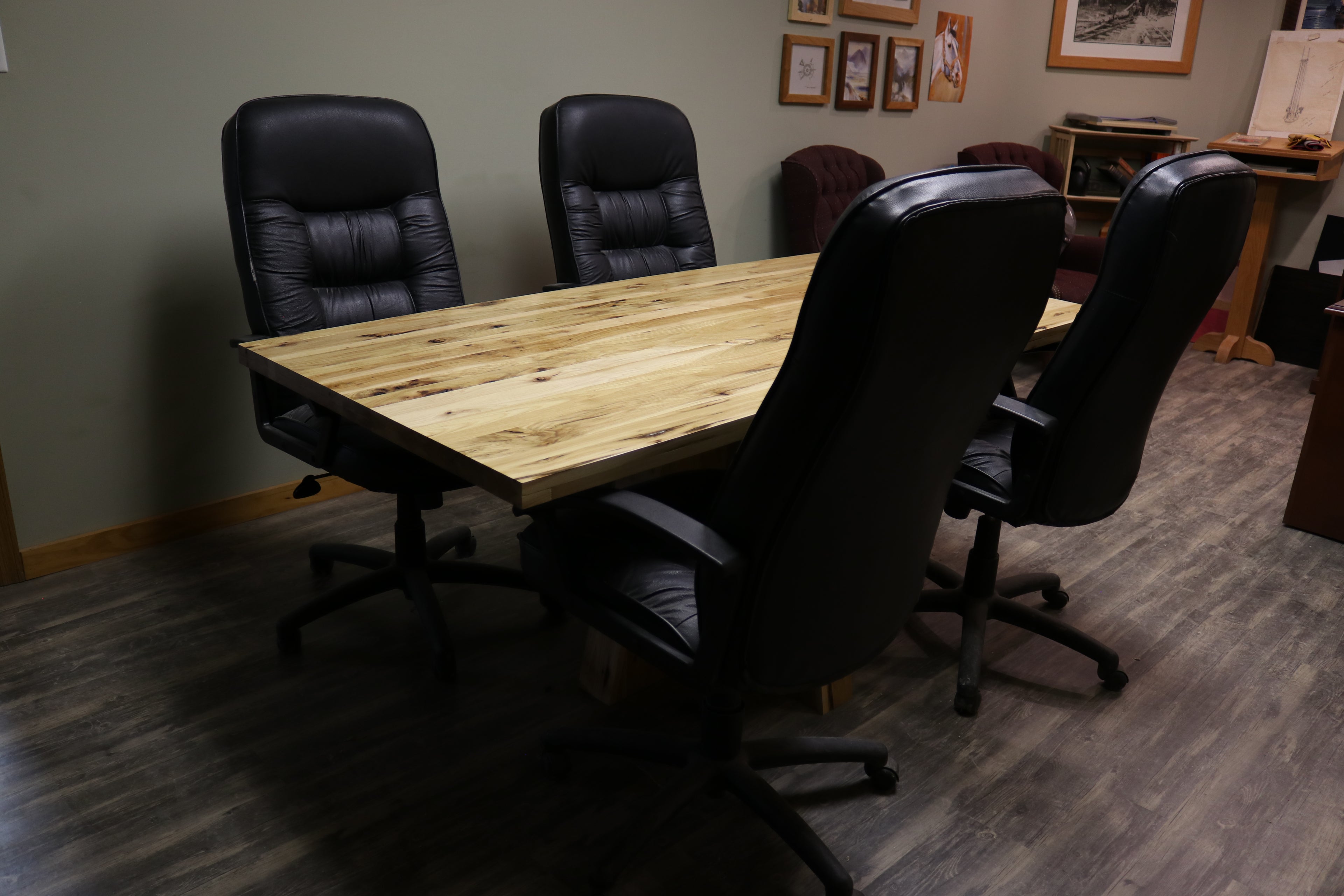 Handcrafted executive office table with a luxurious solid rustic hickory wood top. The table features a rich, natural finish with unique wood grain patterns, adding a touch of sophistication and durability to any office space. American made durable 
