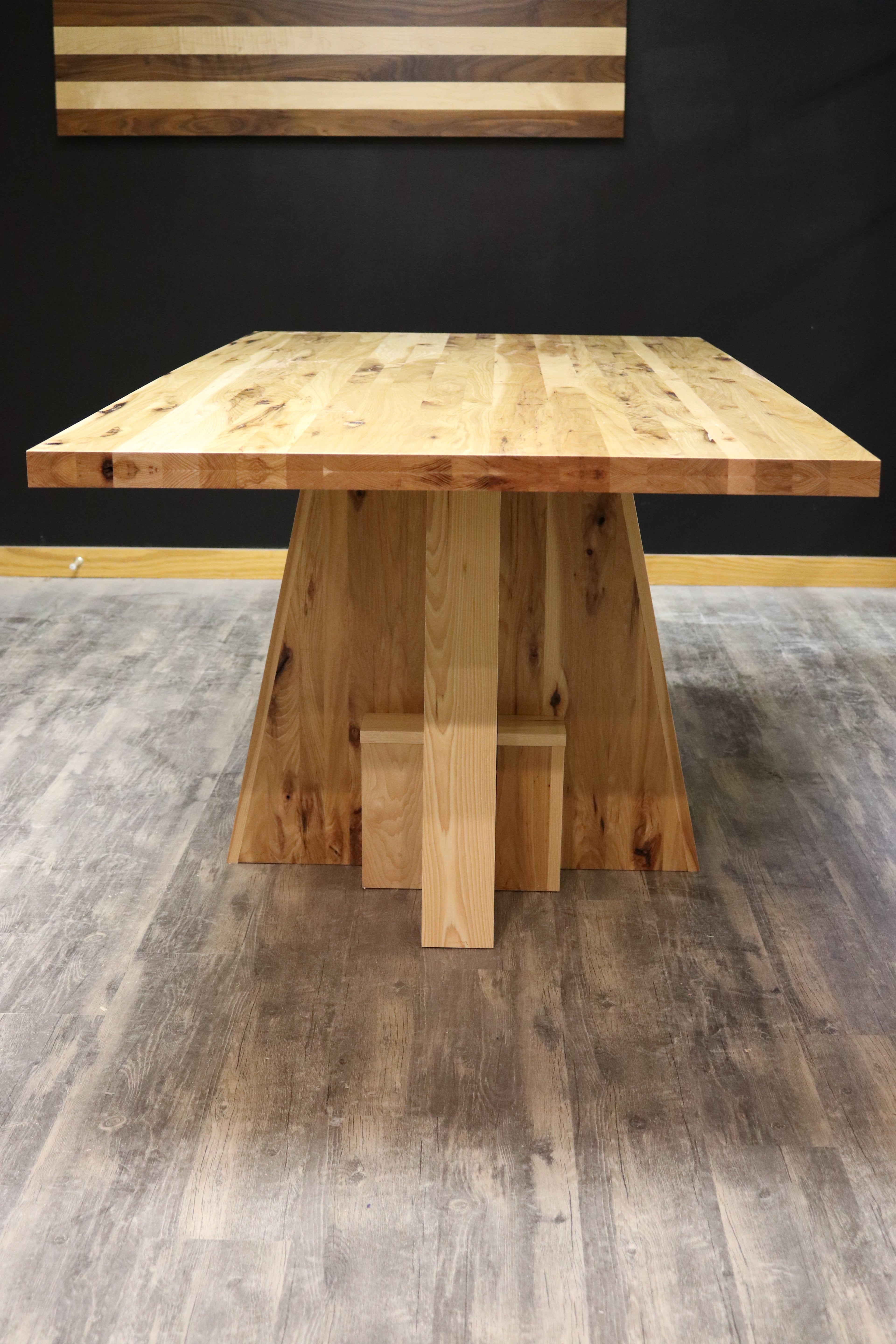 Handcrafted executive office table with a luxurious solid rustic hickory wood top. The table features a rich, natural finish with unique wood grain patterns, adding a touch of sophistication and durability to any office space. American made durable 