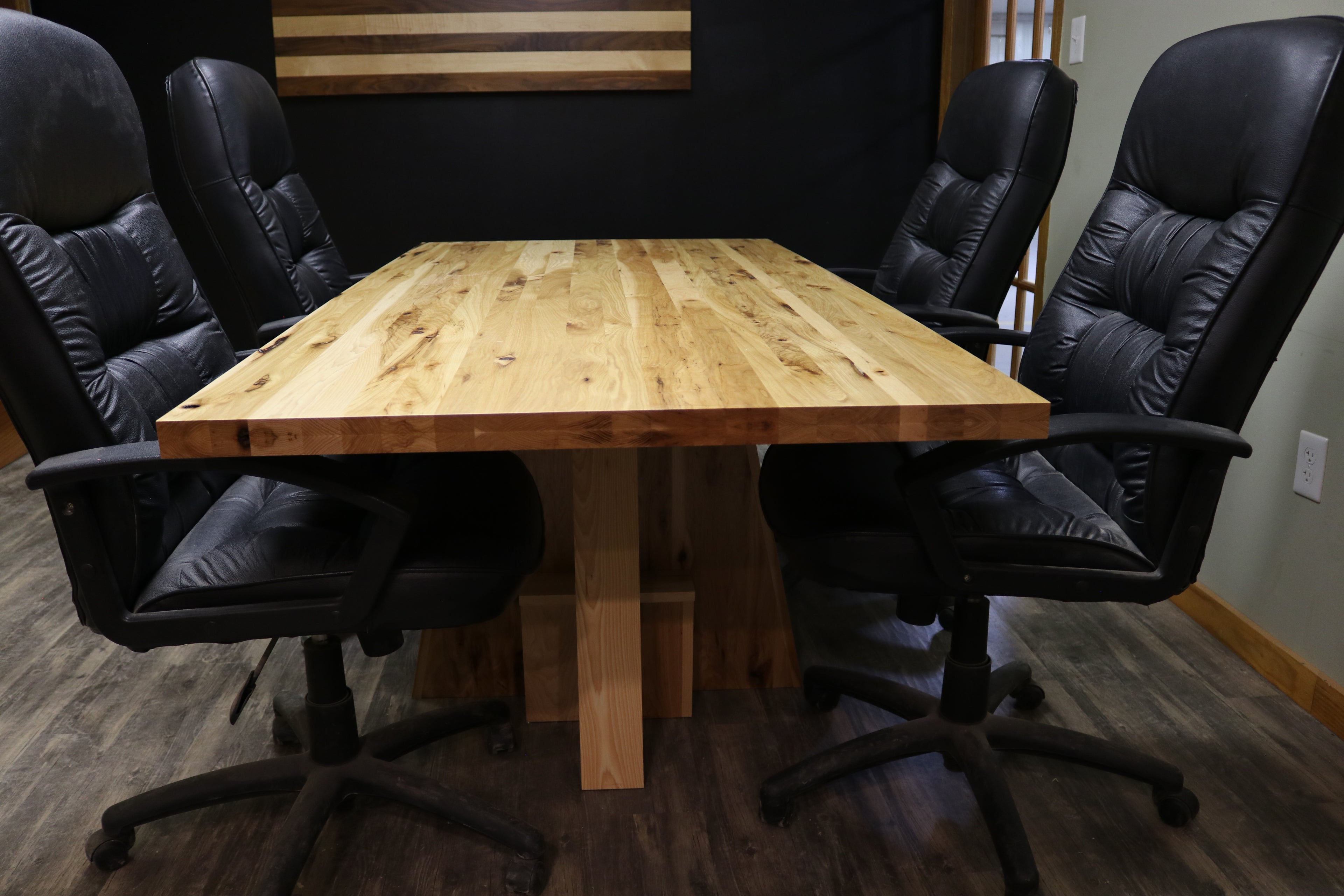 Handcrafted executive office table with a luxurious solid rustic hickory wood top. The table features a rich, natural finish with unique wood grain patterns, adding a touch of sophistication and durability to any office space. American made durable 