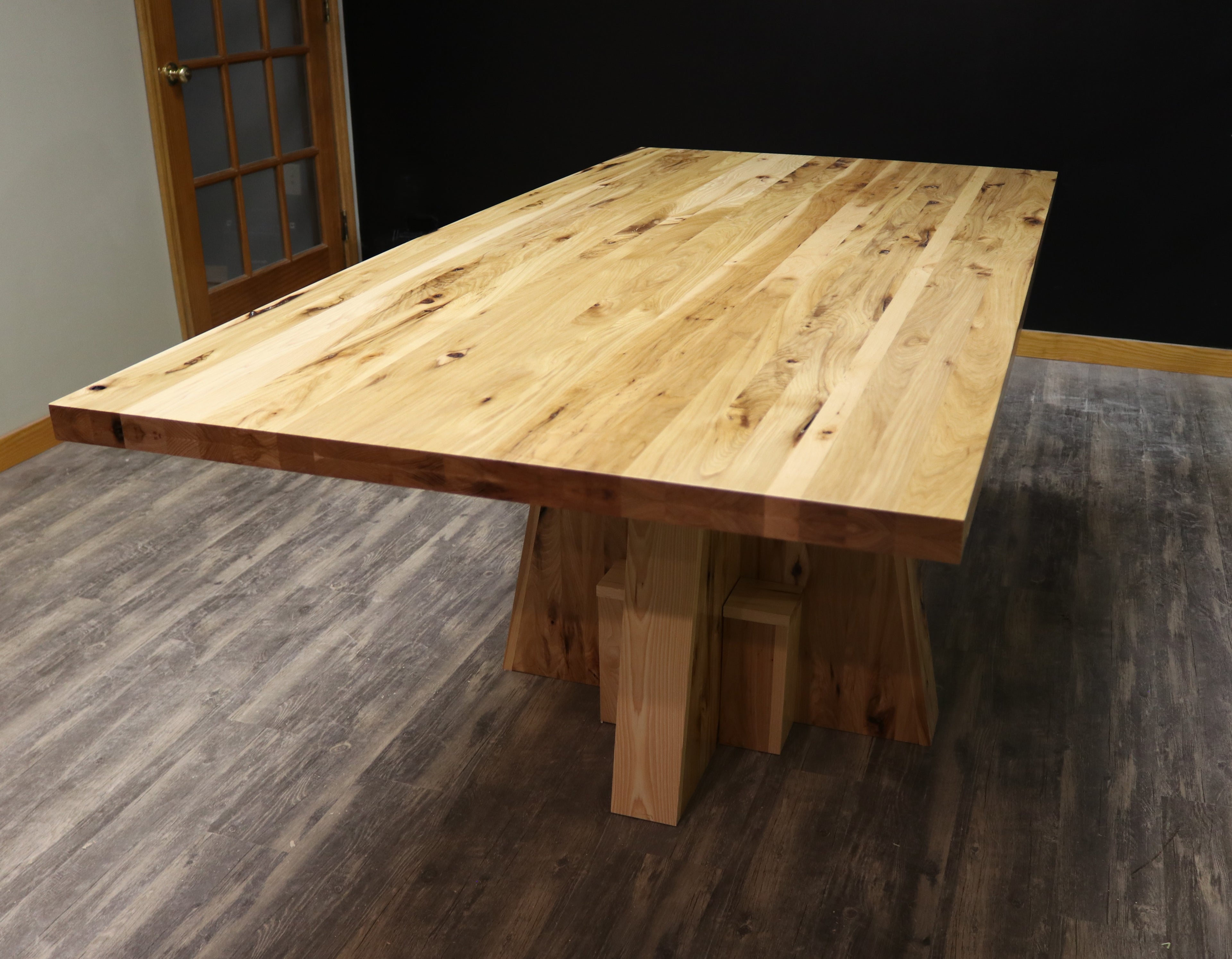 Handcrafted executive office table with a luxurious solid rustic hickory wood top. The table features a rich, natural finish with unique wood grain patterns, adding a touch of sophistication and durability to any office space. American made durable 